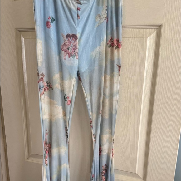 Dolls Kill Pants - Dolls Kill Blue Cloud & Cherub Print Flared Leggings